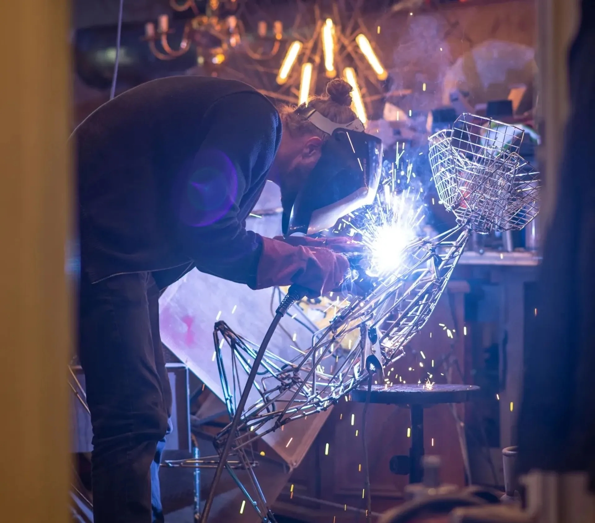 Man welding something with sparks