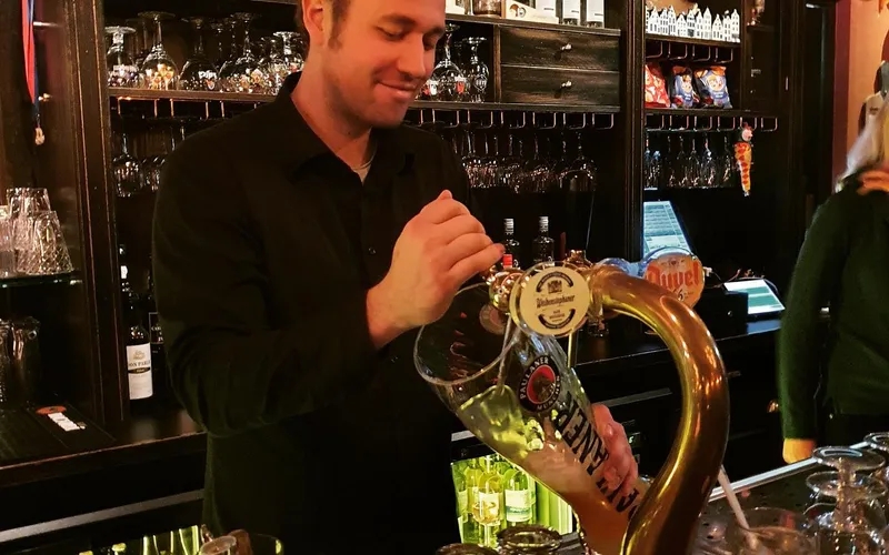 Bartender pouring a beer