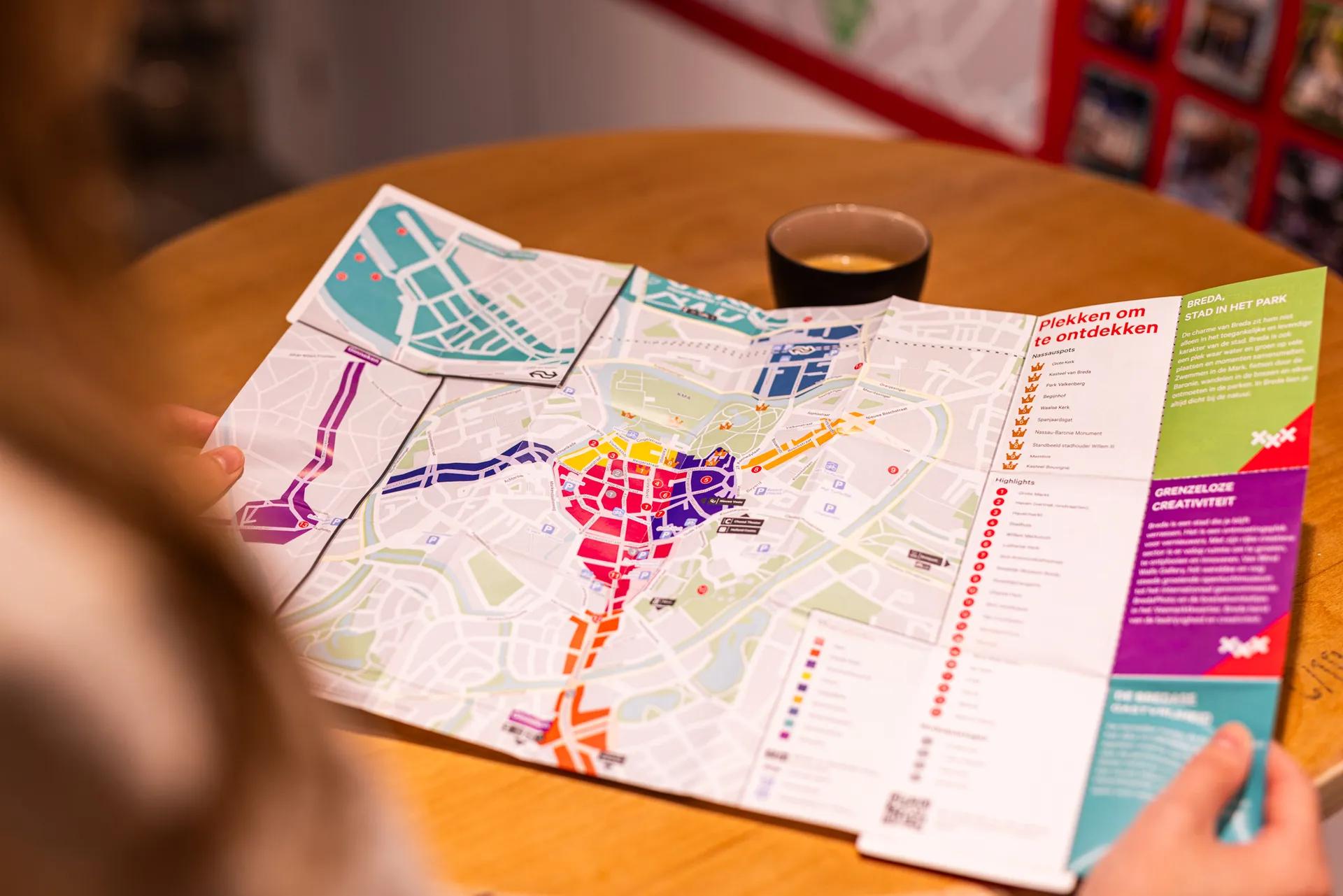 The city map of Breda unfolded on a table